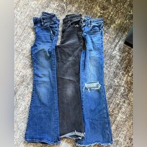 American Eagle Outfitters Flare Jeans Trio in Dark Blue, Black, and Light Blue